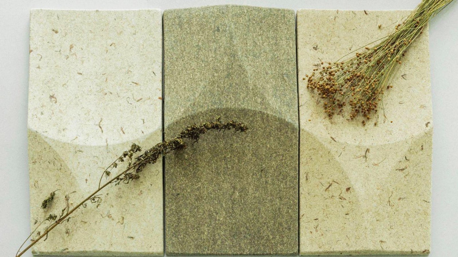 Textured natural surface material panels showing how surface type affects paint adhesion and drying time between coats