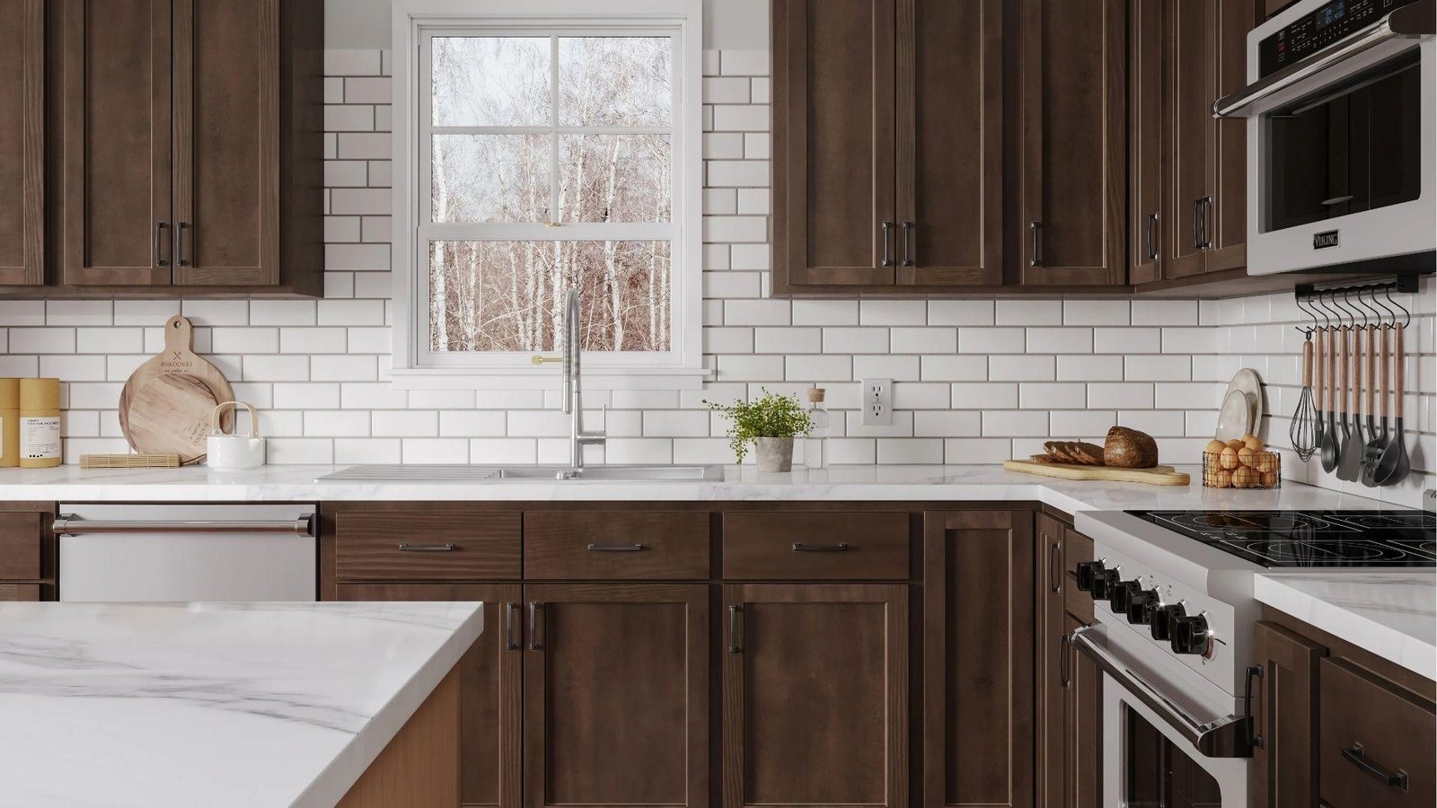Espresso brown cabinets against white subway tile, marble counters, bright clean contrast color scheme