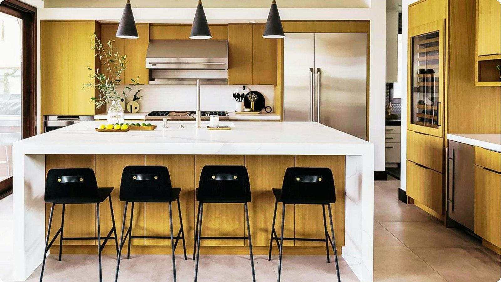Contemporary farmhouse kitchen with white walls and flat-panel honey oak cabinets.
